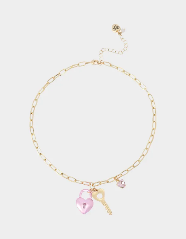 HEART LOCK SHORT PENDANT NECKLACE PINK sold by Betsey Johnson