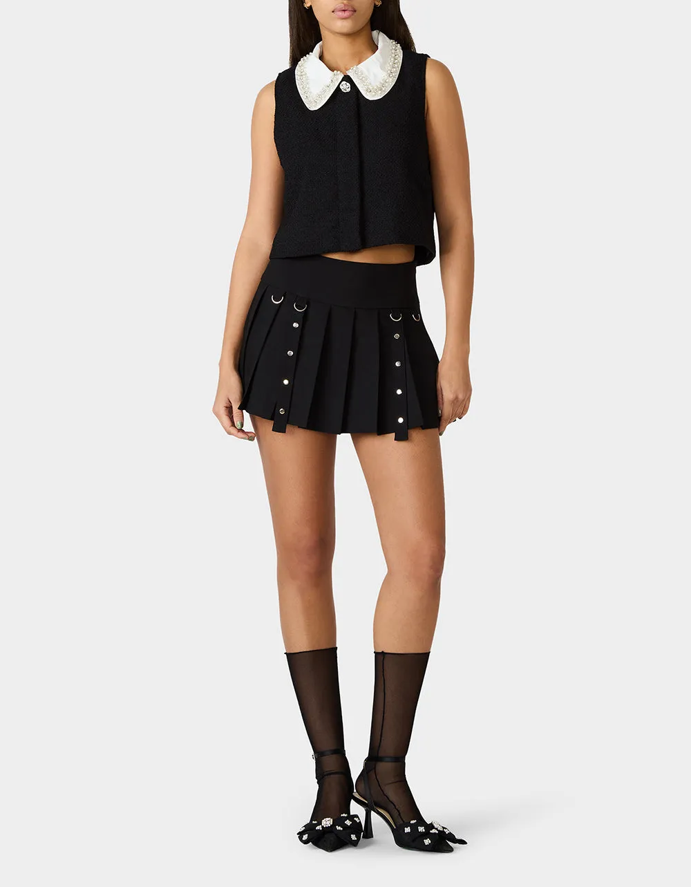 REBEL RIVET PLEATED SKIRT BLACK sold by Betsey Johnson
