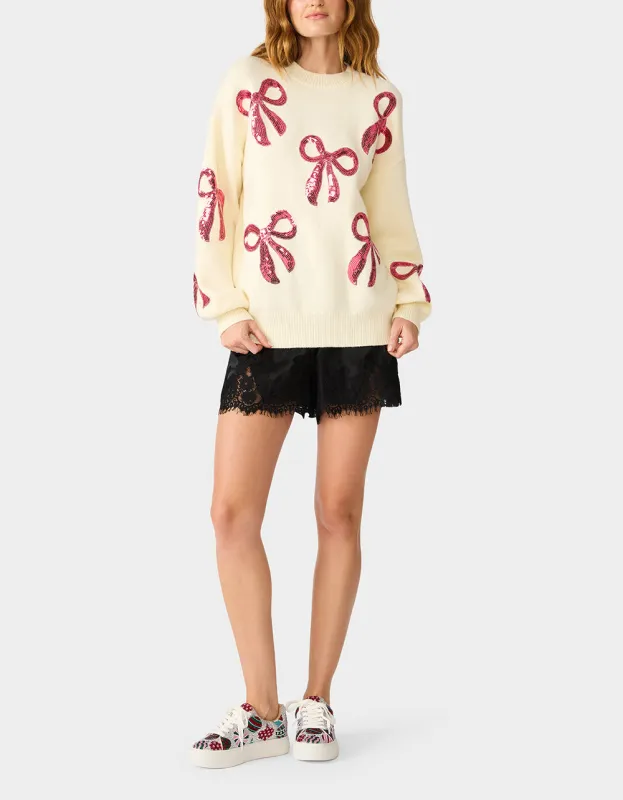 SEQUIN BOW SWEATER CREAM made by Betsey Johnson