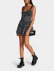 RHINESTONE FLOWER CROSSBODY BLACK sold by Betsey Johnson