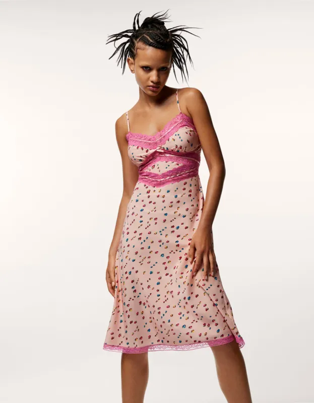 BETSEYS SLEEVELESS RIBBON DRESS CORAL sold by Betsey Johnson