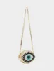 KITSCH THE EYES HAVE IT CROSSBODY GOLD sold by Betsey Johnson