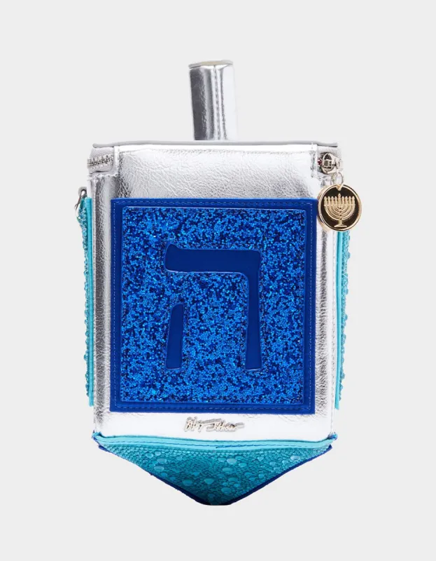 KITSCH SPIN TO WIN CROSSBODY BLUE sold by Betsey Johnson