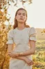 Dorothy Milk Broderie Dress sold by Beulah