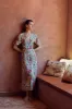 Eva Floral Wrap Dress sold by Beulah