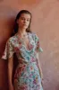 Eva Floral Wrap Dress sold by Beulah