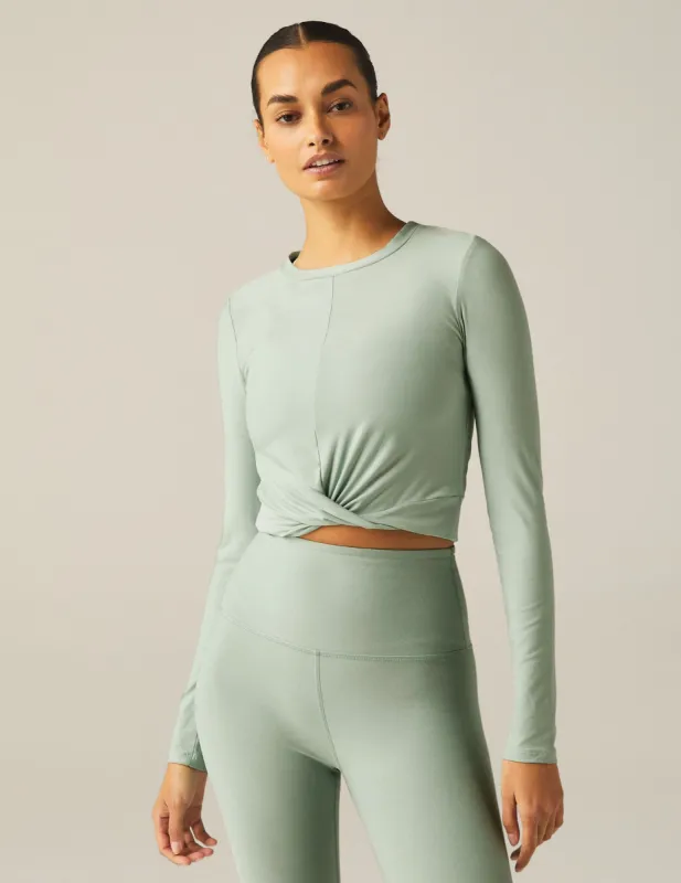 Featherweight Center Stage Cropped Long Sleeve Pullover sold by Beyond Yoga