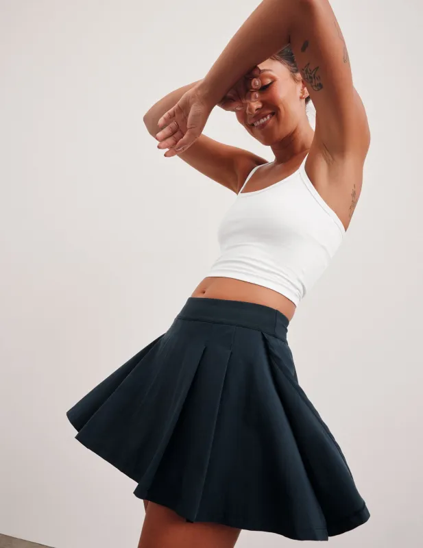 Score Pleated Skirt sold by Beyond Yoga