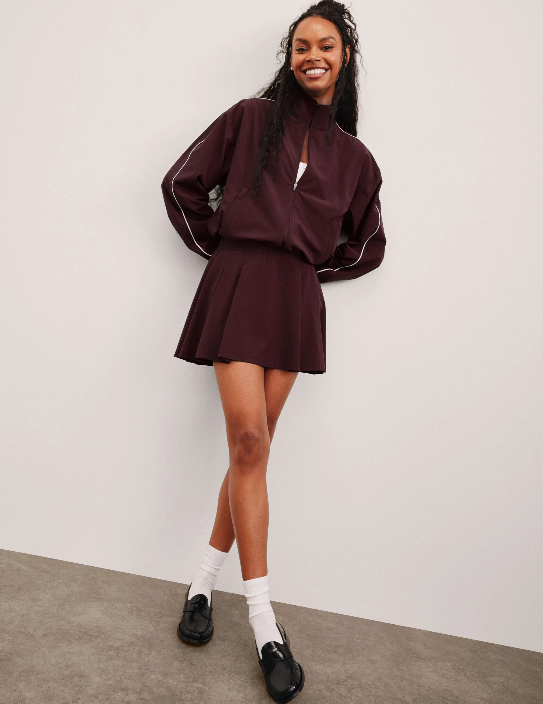 Score Pleated Skirt sold by Beyond Yoga