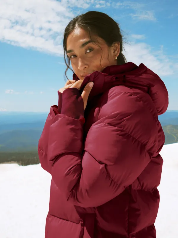 Warm Up Hooded Long Puffer Jacket sold by Beyond Yoga