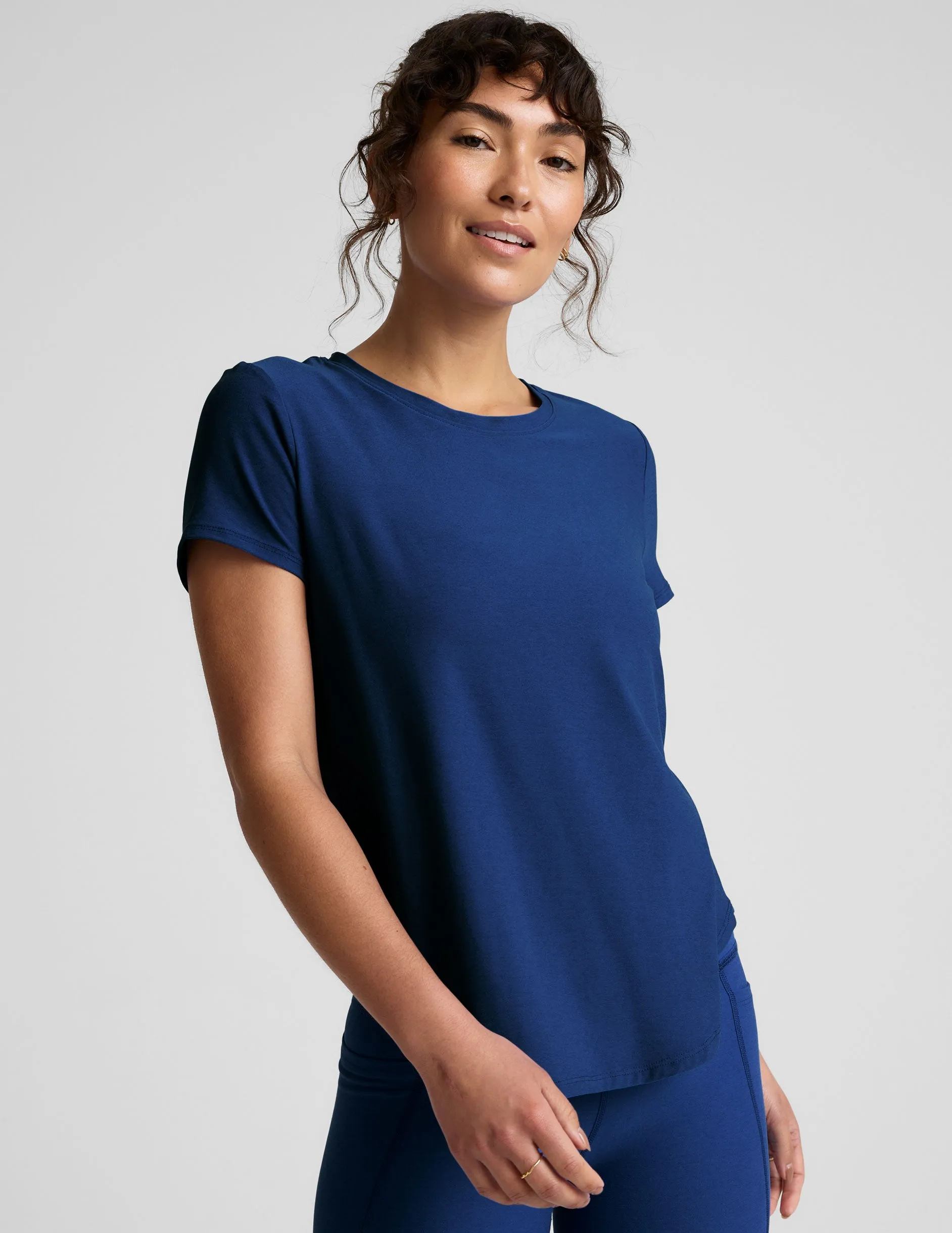 Featherweight On The Down Low Tee sold by Beyond Yoga