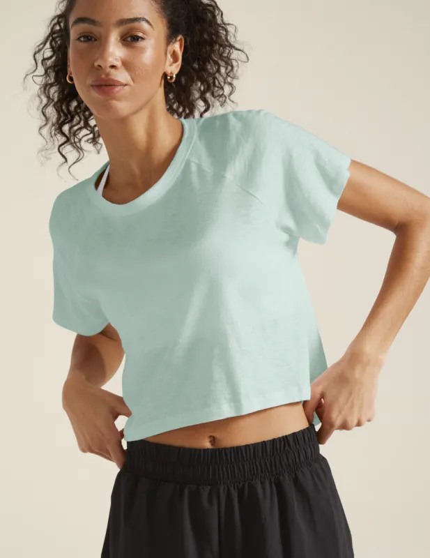 Signature High Low Cropped Tee sold by Beyond Yoga