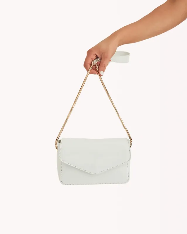 ROSIE CROSS BODY BAG - WHITE PATENT sold by Billini
