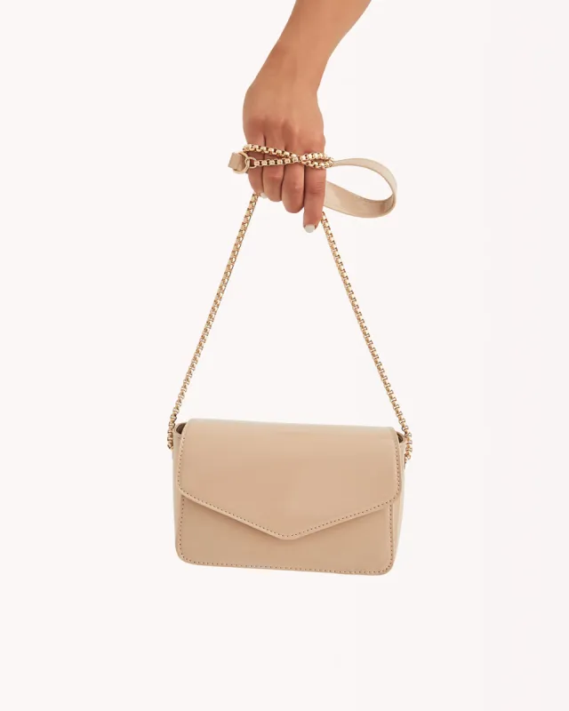 ROSIE CROSS BODY BAG - NUDE PATENT sold by Billini