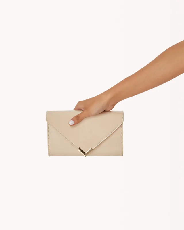 KARLIE CLUTCH BAG - NUDE PATENT sold by Billini