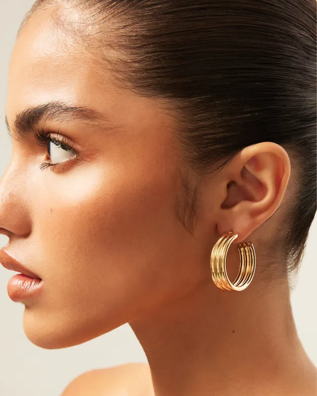 LEXIE EARRINGS - GOLD sold by Billini