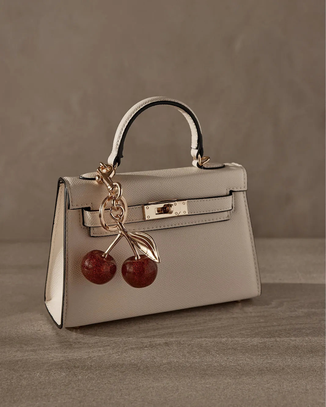 CHERRY BAG CHARM - GOLD sold by Billini