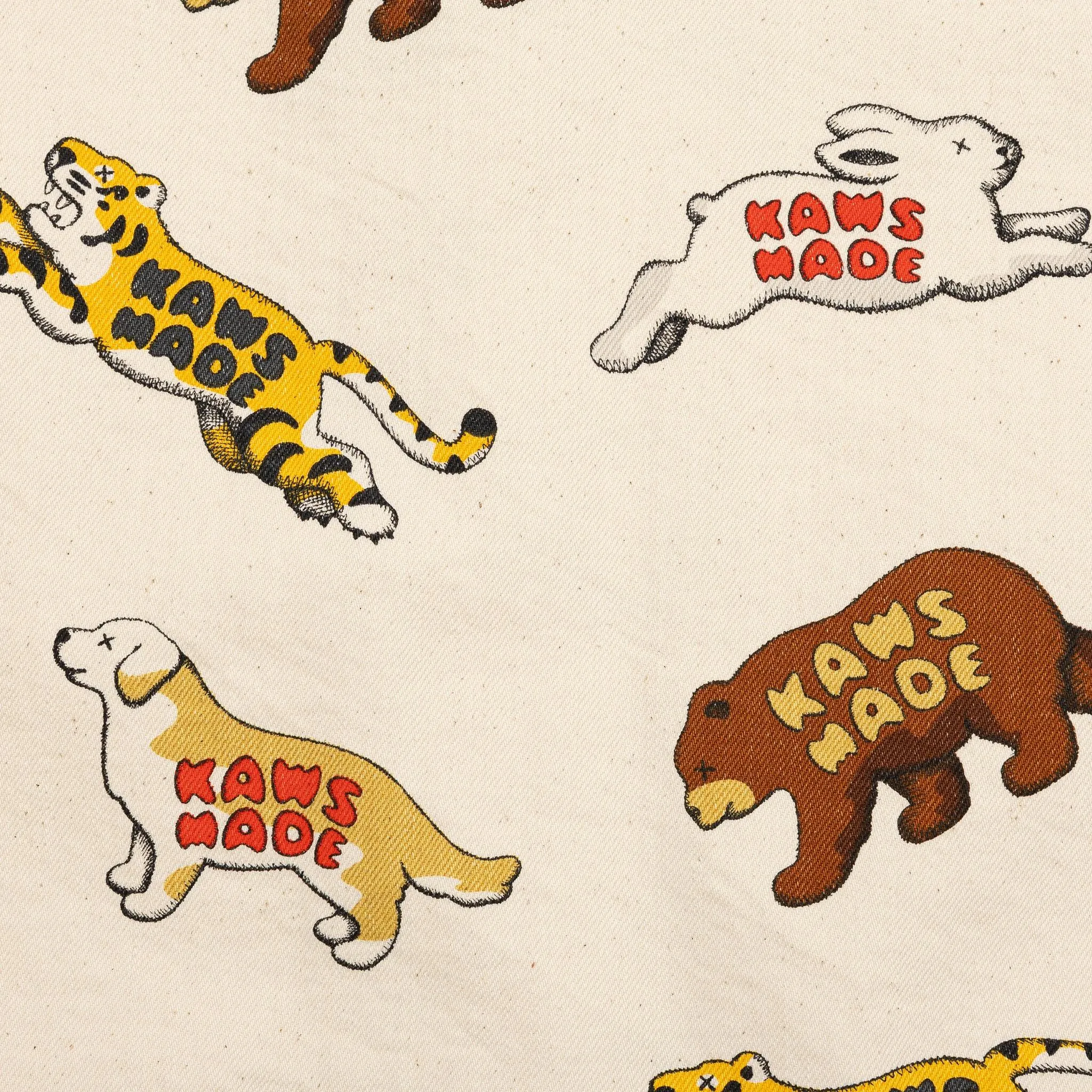 HUMAN MADE × KAWS MADE ANIMAL PANTS KAWS x Human Made Animal Pattern Pants - Size Medium - Beige