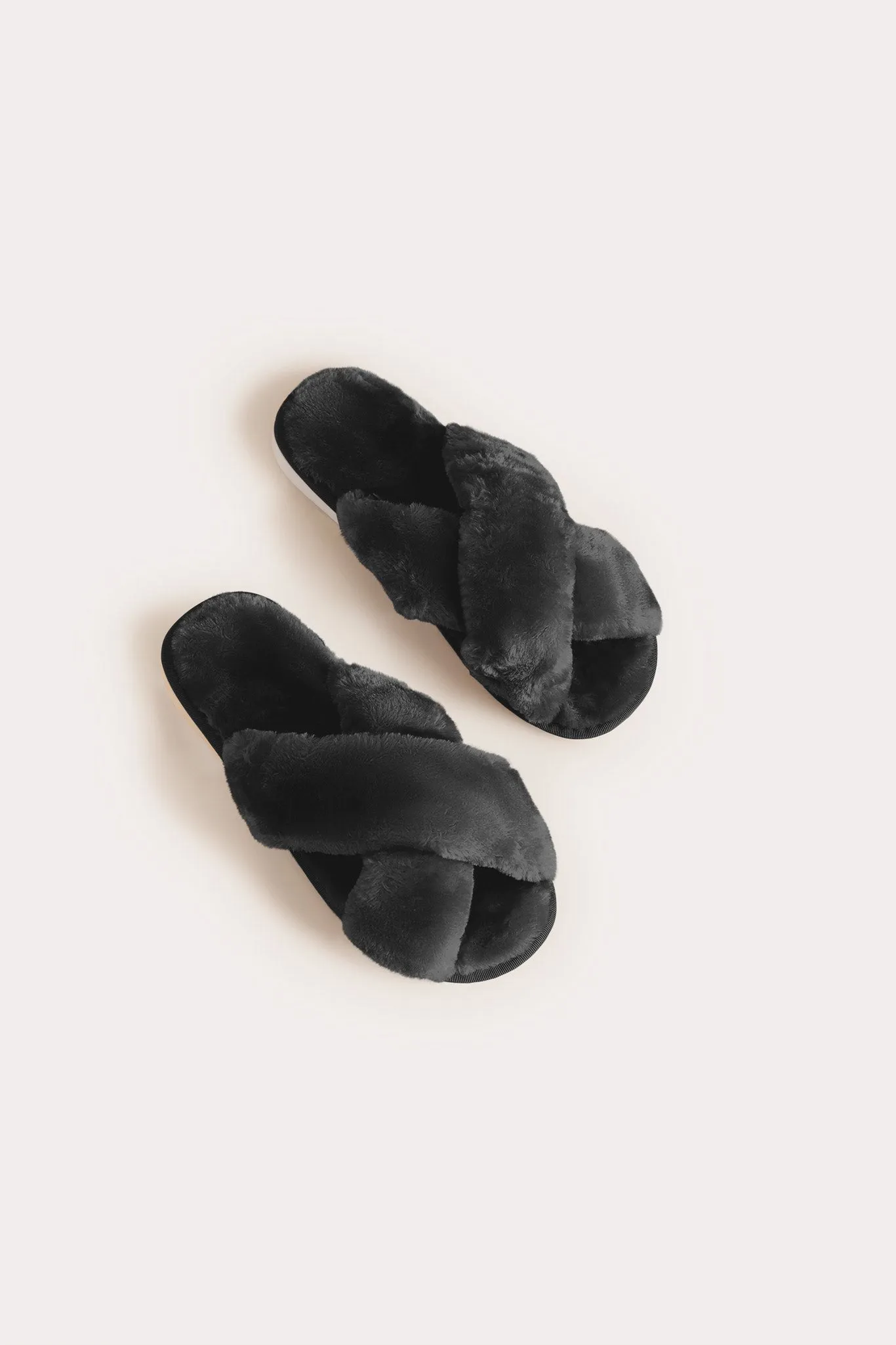 Criss Cross Fuzzy Slippers - Black sold by Birdy Grey