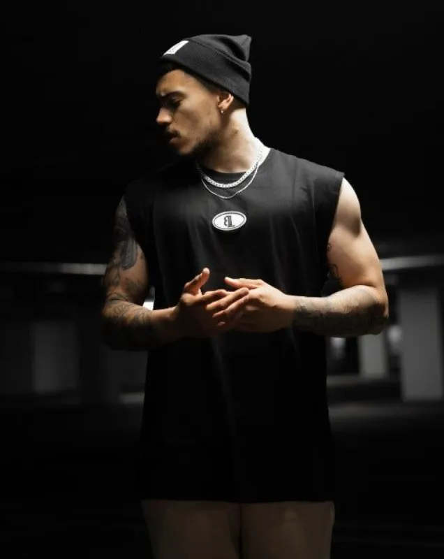 Black Rubber Logo Oversized Sleeveless T-Shirt sold by Black Label