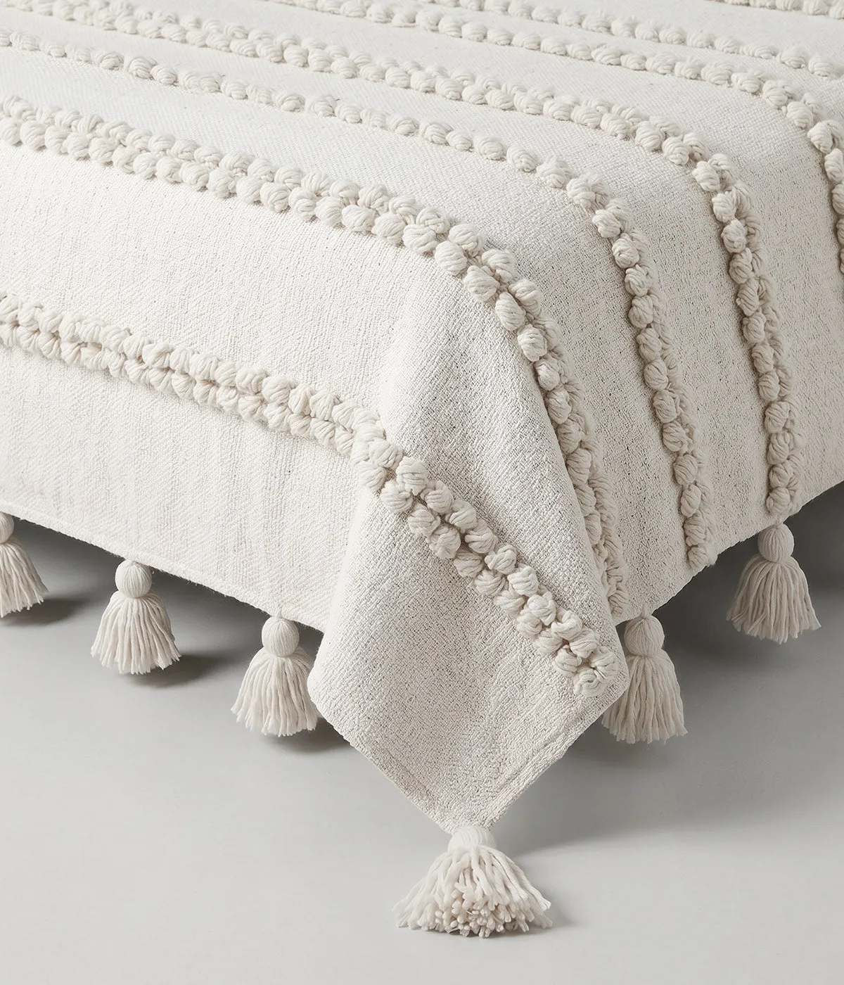 Pom Pom Stripe Wool Quilt sold by Bloomist