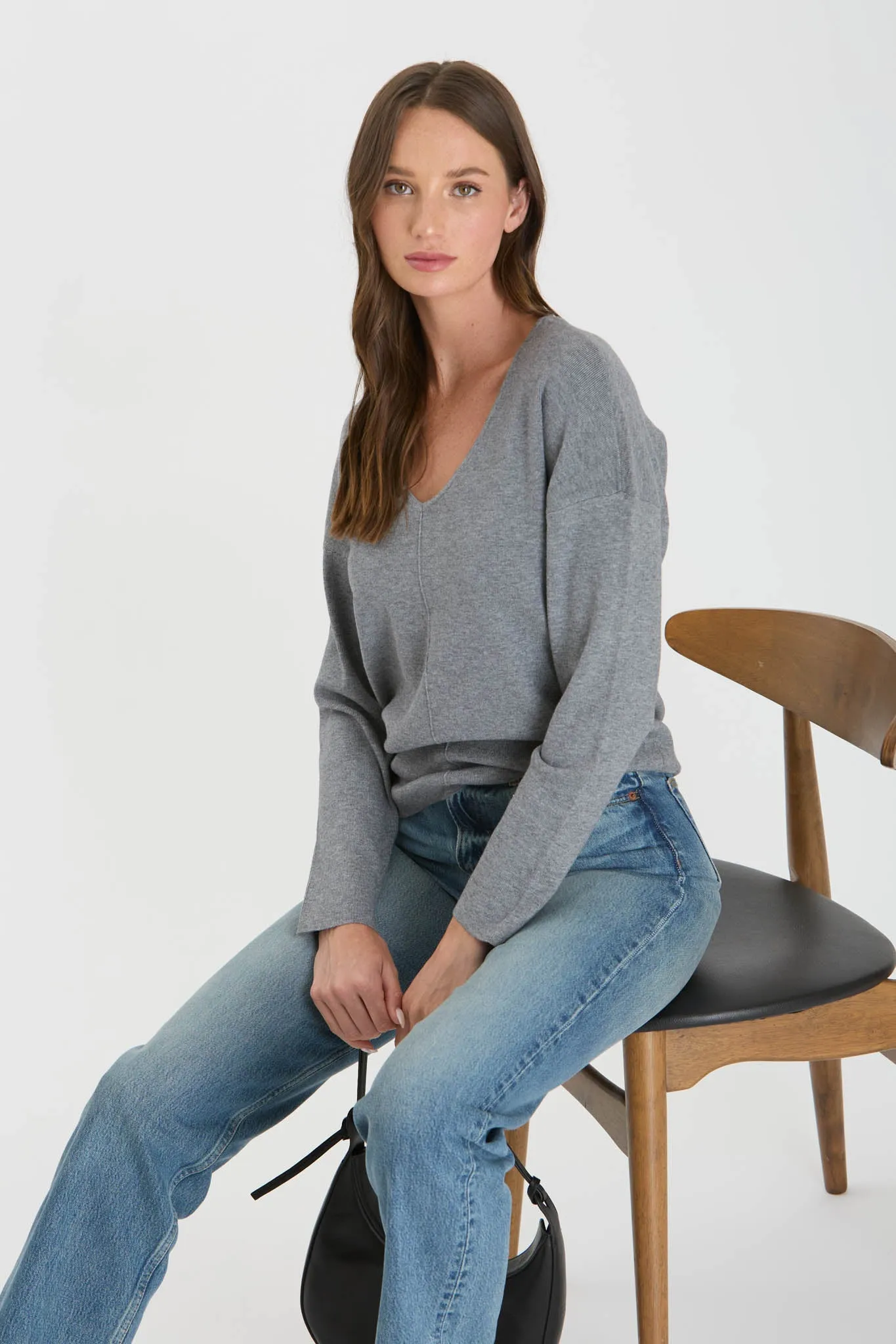 SOLID V NECK FRONT SEAM KNIT SWEATER sold by Blu Pepper