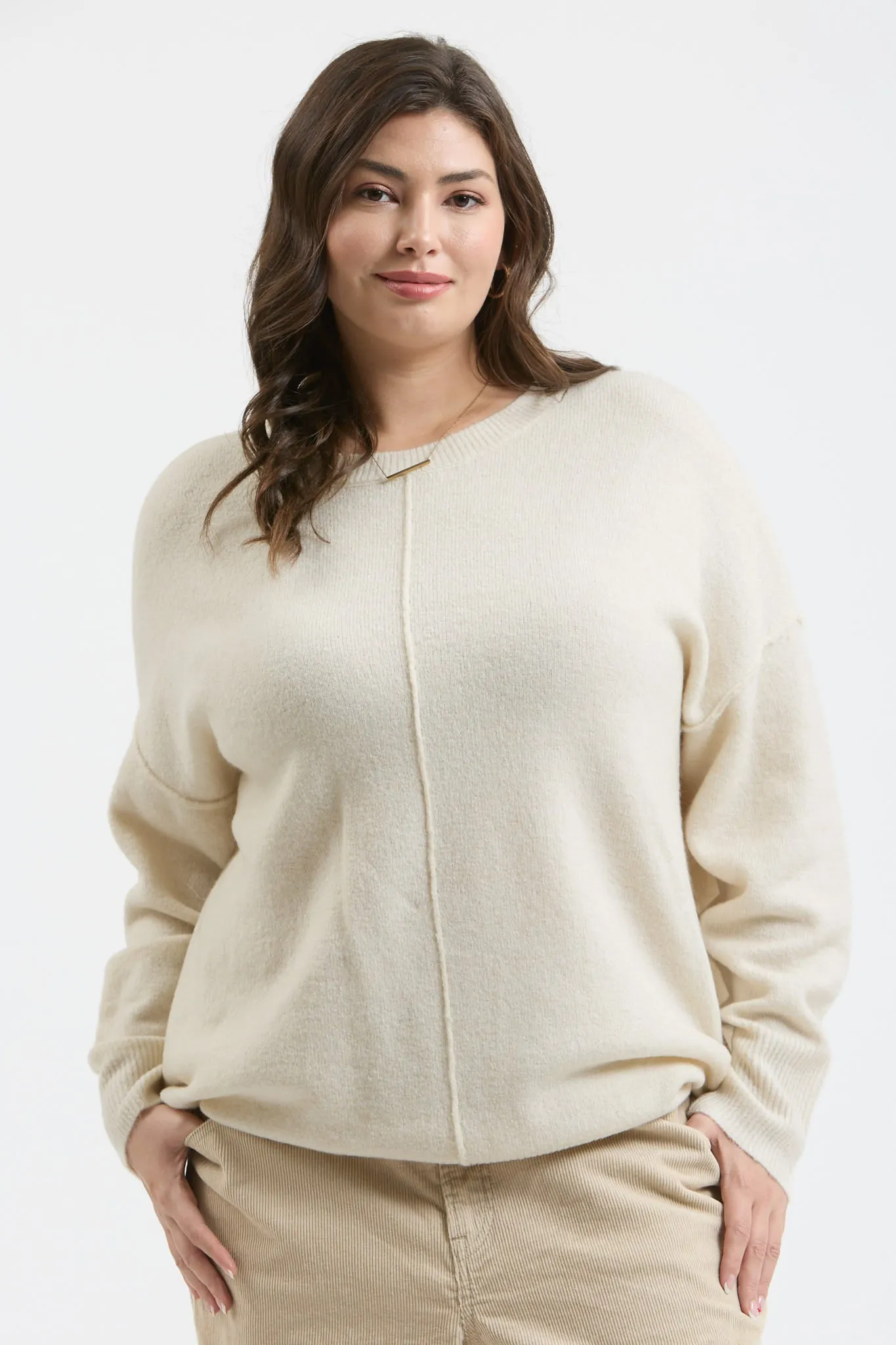 PLUS SOLID CREWNECK FRONT SEAM KNIT SWEATER sold by Blu Pepper