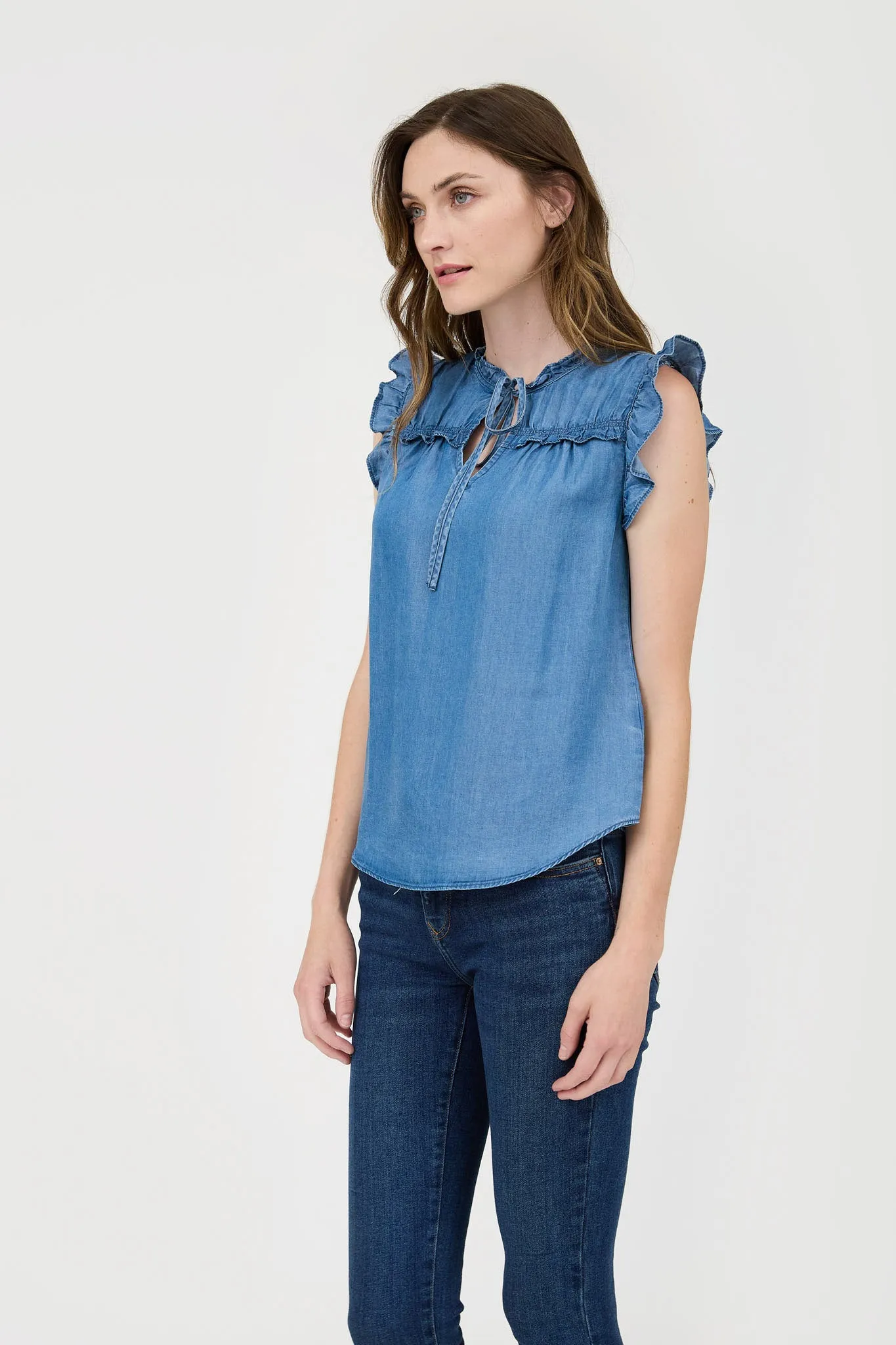 CHAMBRAY RUFFLE TIE FRONT SLEEVELESS BLOUSE sold by Blu Pepper product image thumbnail 3
