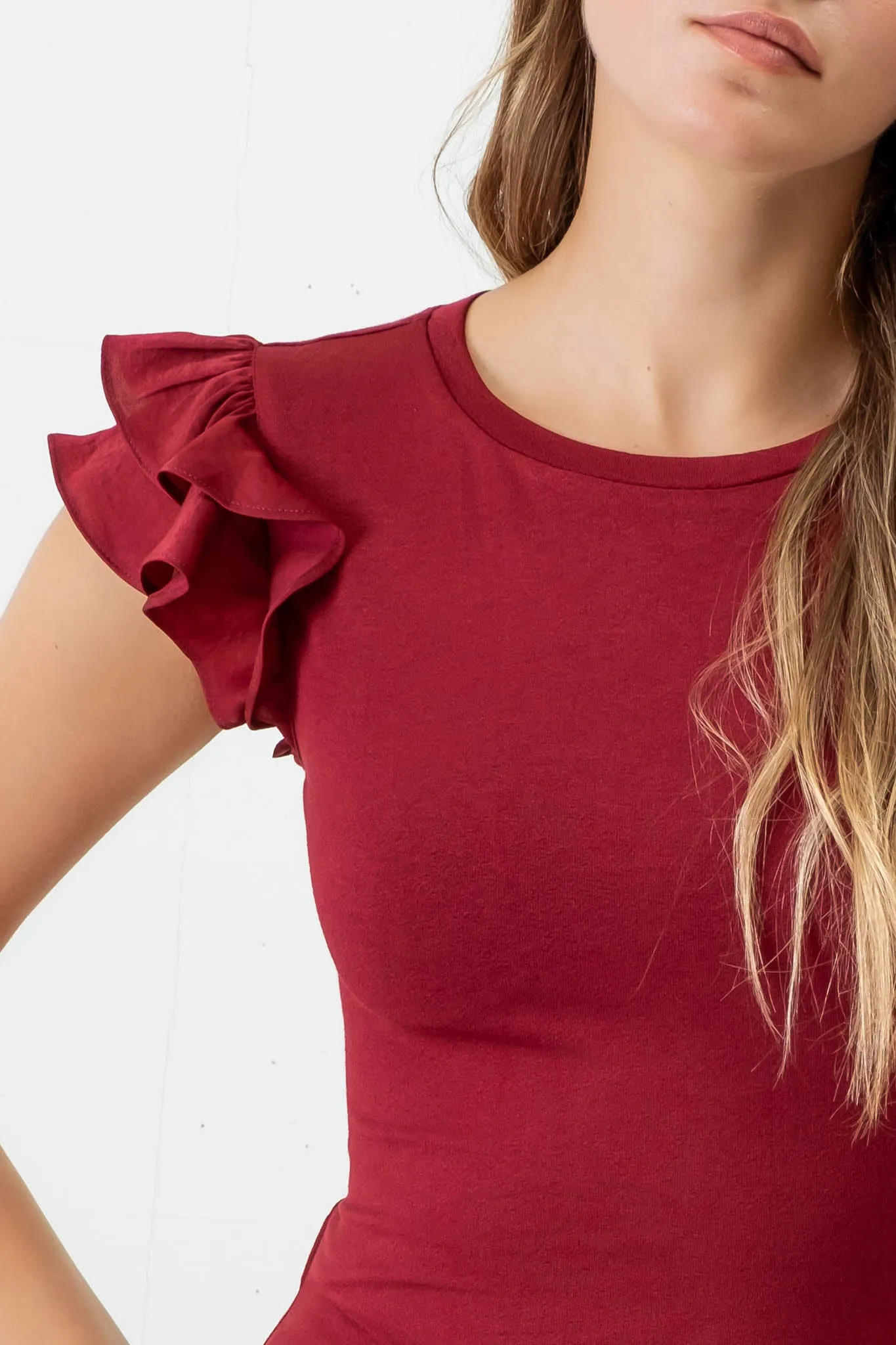 SOLID RUFFLE FLUTTER SLEEVE KNIT TOP sold by Blu Pepper product image thumbnail 4