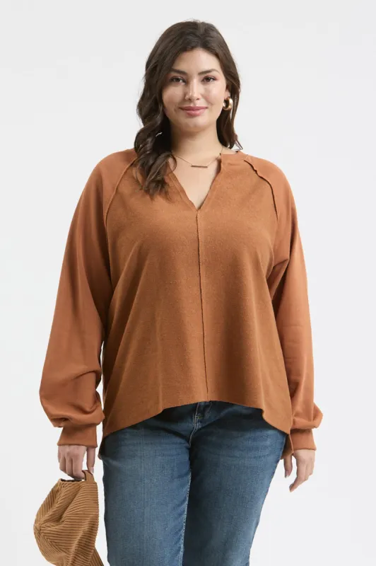PLUS EXPOSED SEAM RELAXED LONG SLEEVE KNIT TOP sold by Blu Pepper