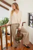 EXPOSED SEAM SPLIT NECK KNIT SWEATER sold by Blu Pepper
