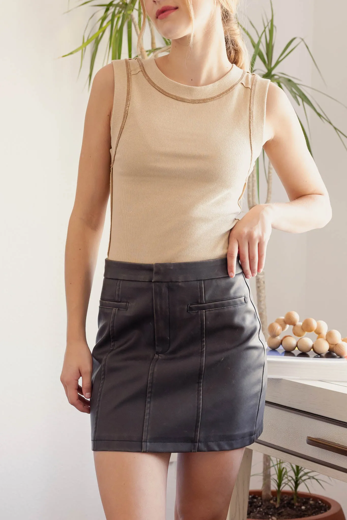 WASHED FAUX LEATHER MINI SKIRT sold by Blu Pepper