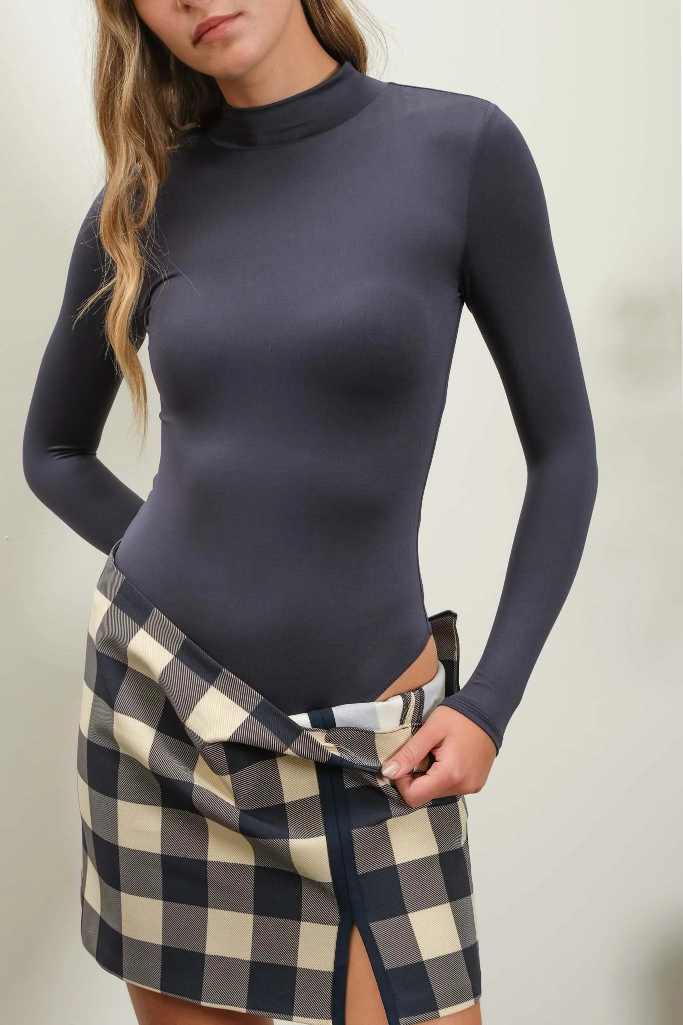SEAMLESS MOCK NECK LONG SLEEVE BODYSUIT sold by Blu Pepper
