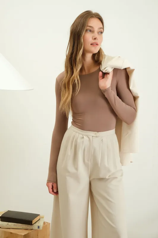 SOLID ROUND NECK LONG SLEEVE BODYSUIT sold by Blu Pepper