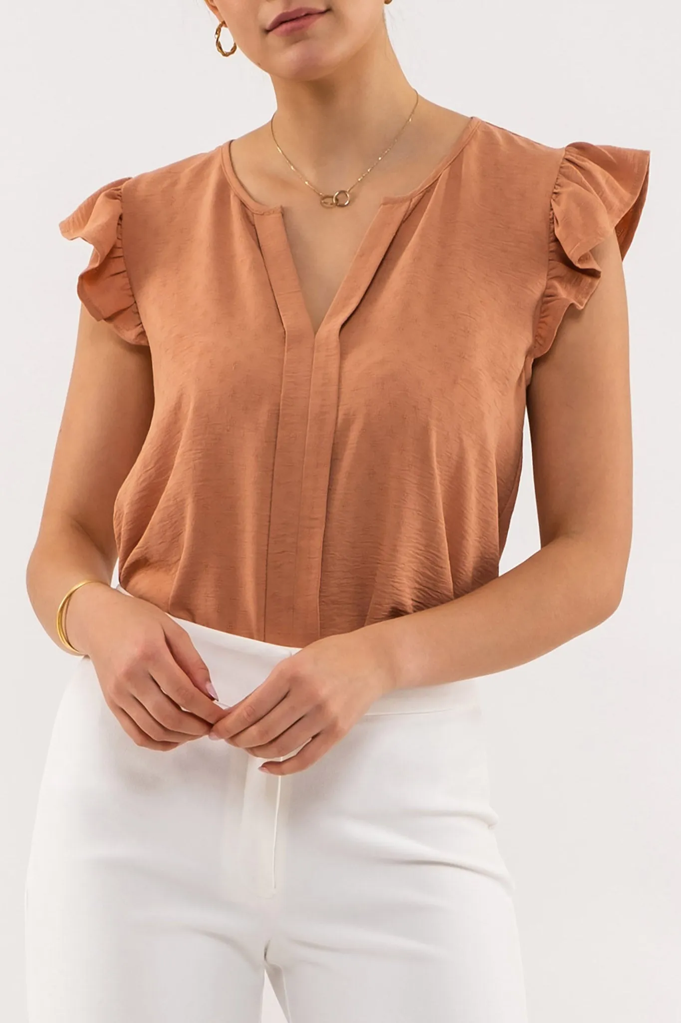 SPLIT NECK RUFFLE SLEEVE TOP sold by Blu Pepper
