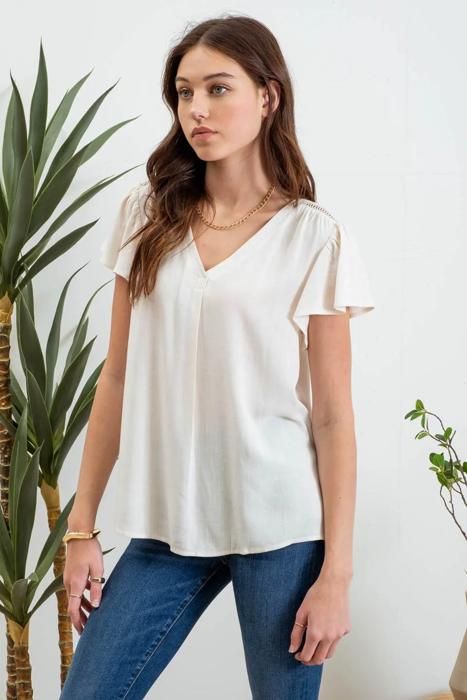 FOLDED V NECK SHORT RUFFLE SLEEVE TOP sold by Blu Pepper product image thumbnail 3