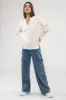 RAW EDGE SPLIT NECK AND HEM RIB KNIT TOP sold by Blu Pepper