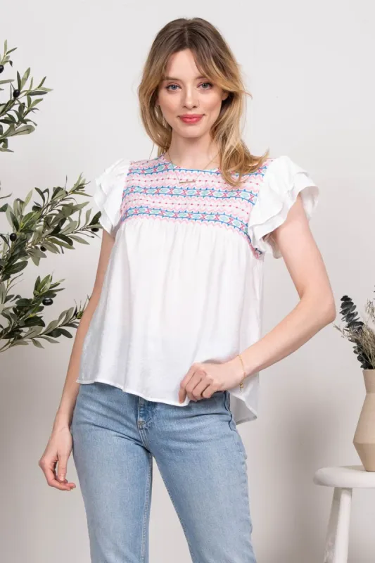 MULTICOLOR EMBROIDERY WOVEN TOP sold by Blu Pepper