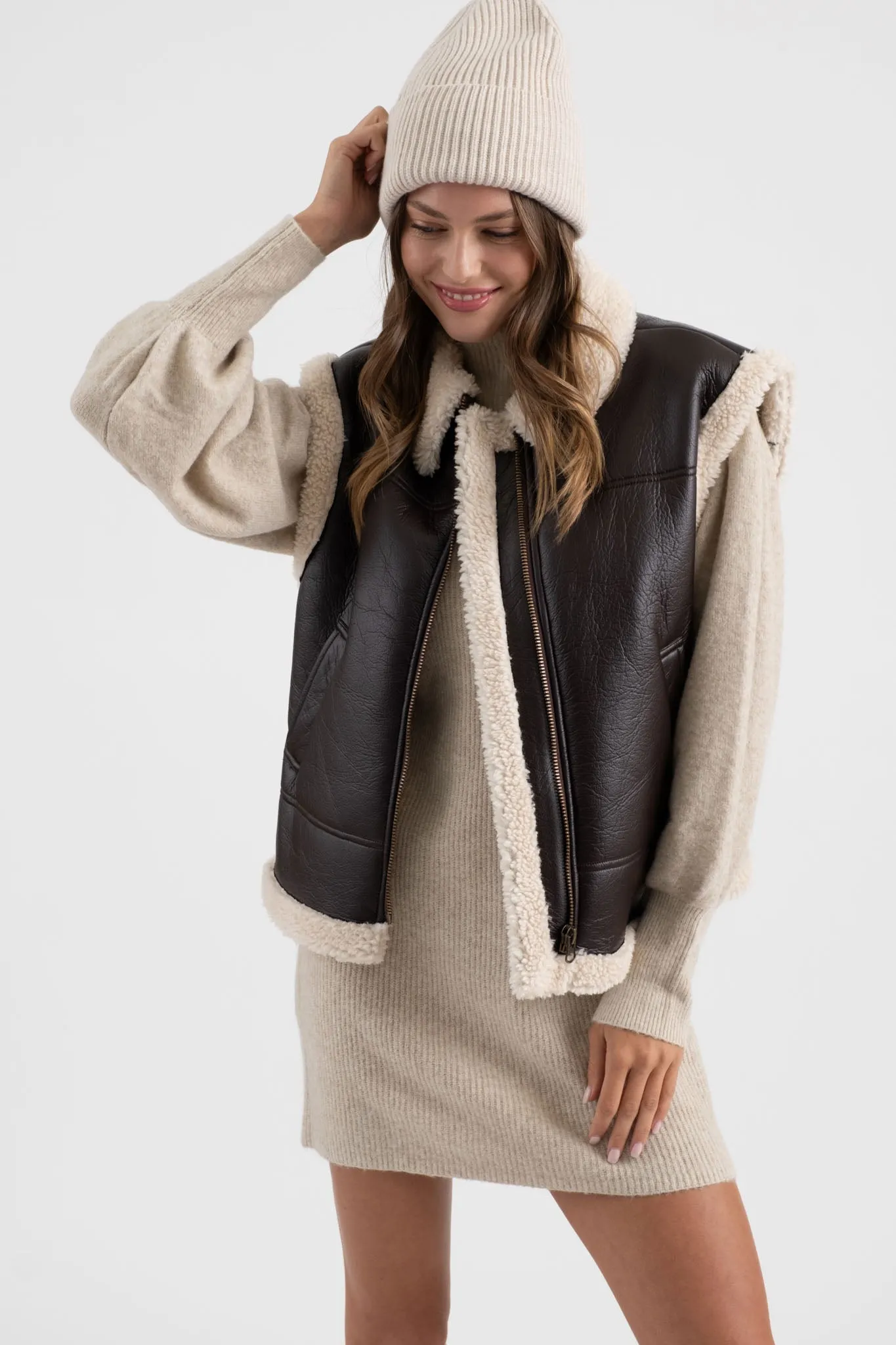 FAUX LEATHER SHEARLING VEST sold by Blu Pepper