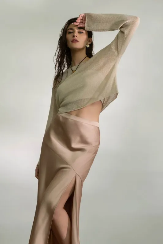 SATIN ASYMMETRICAL SIDE SLIT MIDI SKIRT sold by Blu Pepper