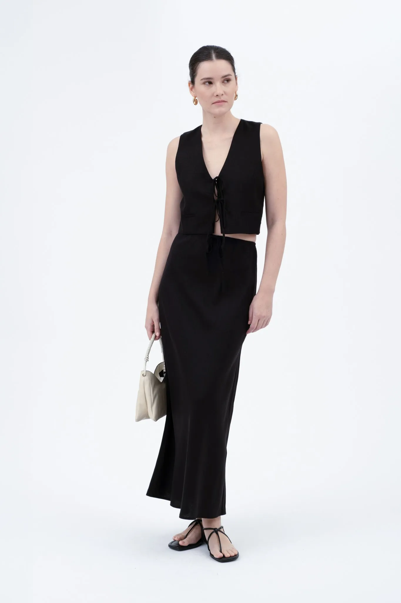 V NECK FRONT TIE CROPPED VEST sold by Blu Pepper