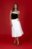 MIXED MEDIA FRONT TIE SLEEVELESS KNIT CROP TOP sold by Blu Pepper
