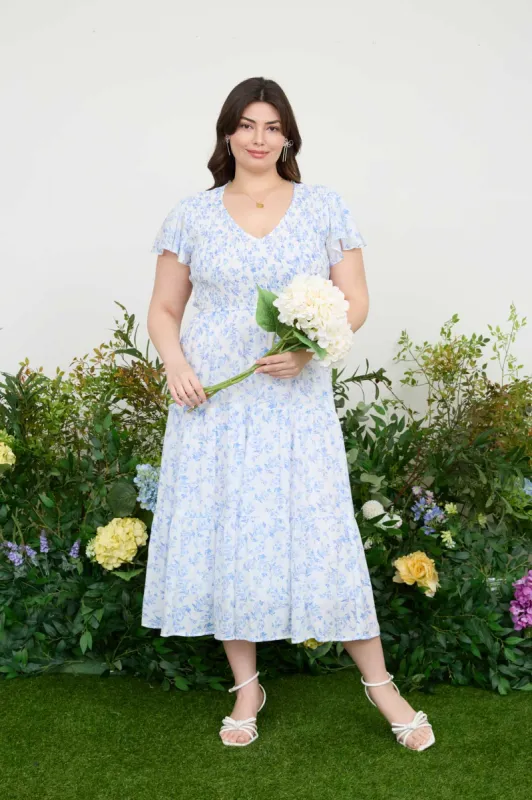 PLUS FLORAL V NECK SMOCKED SHORT SLEEVE MIDI DRESS sold by Blu Pepper