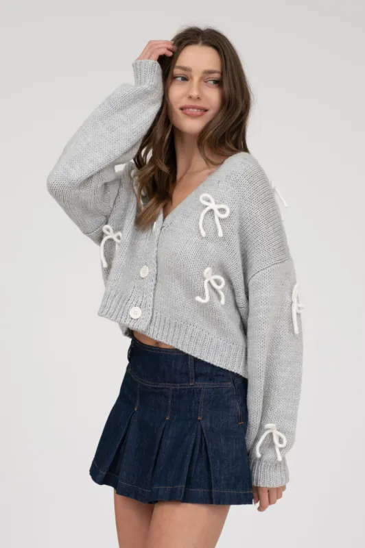 BOW DETAIL BUTTON DOWN CROPPED KNIT CARDIGAN sold by Blu Pepper