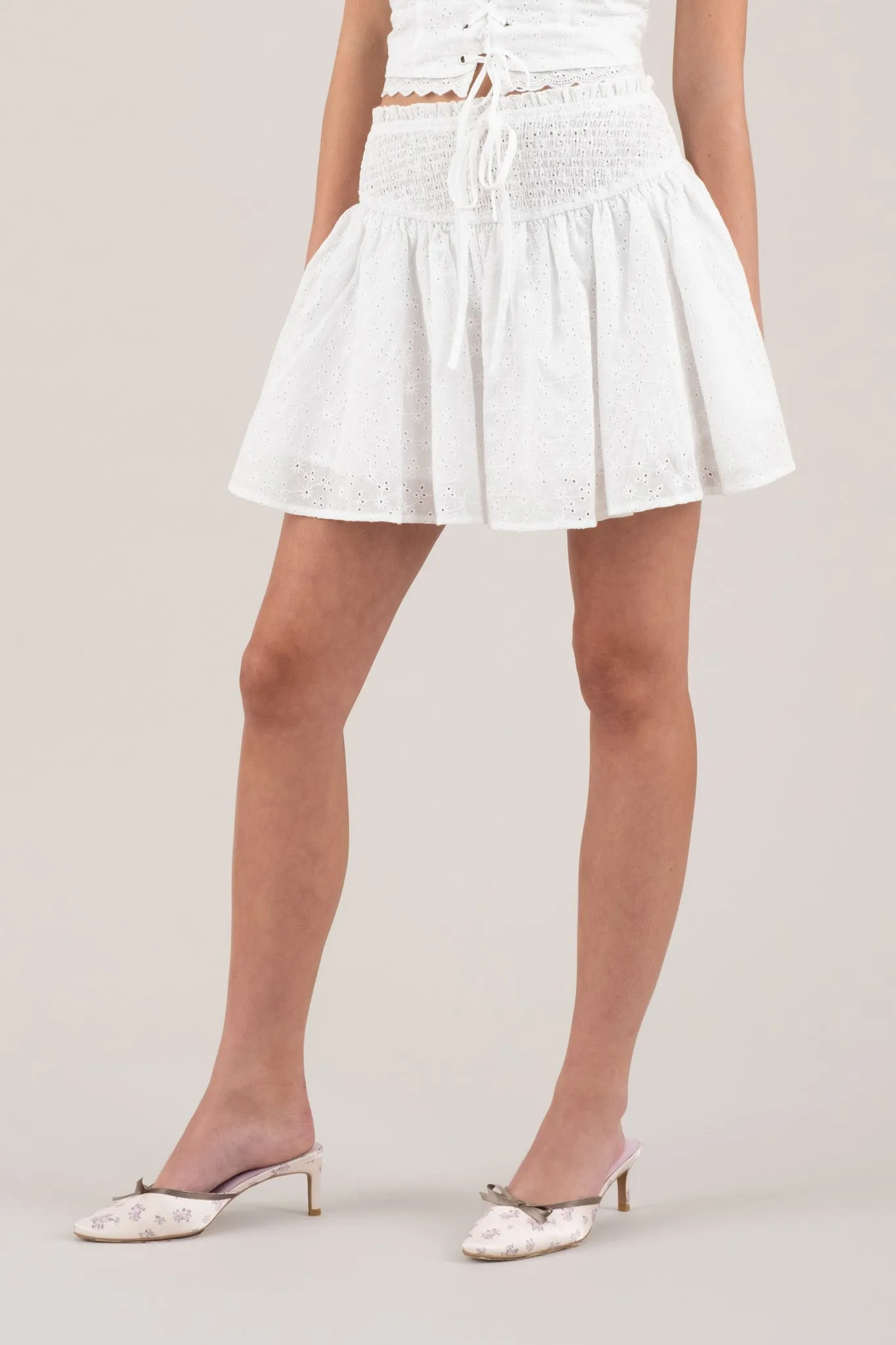 EMBROIDERED EYELET SMOCKED MINI SKIRT sold by Blu Pepper product image thumbnail 3