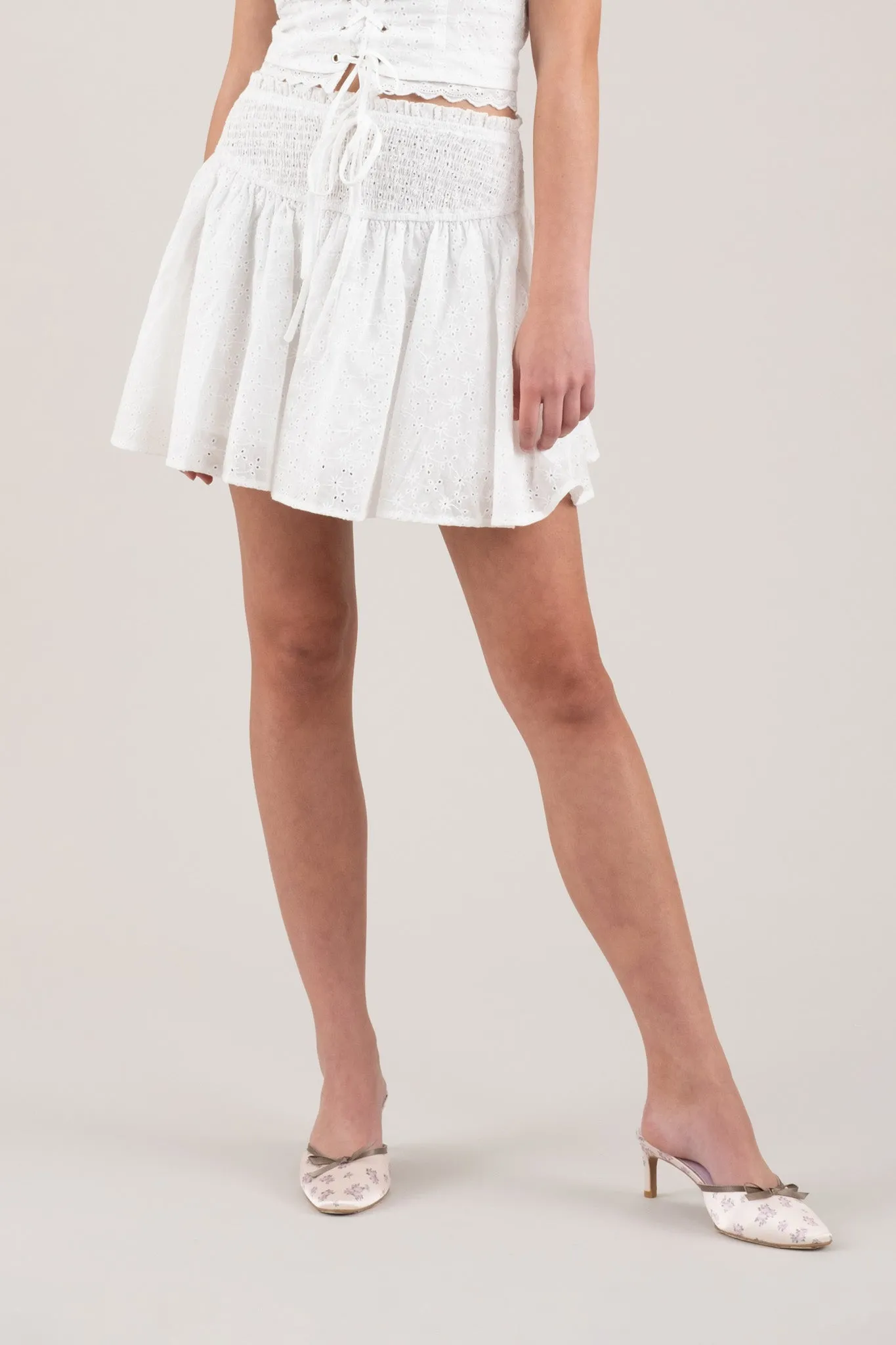 EMBROIDERED EYELET SMOCKED MINI SKIRT sold by Blu Pepper product image thumbnail 4