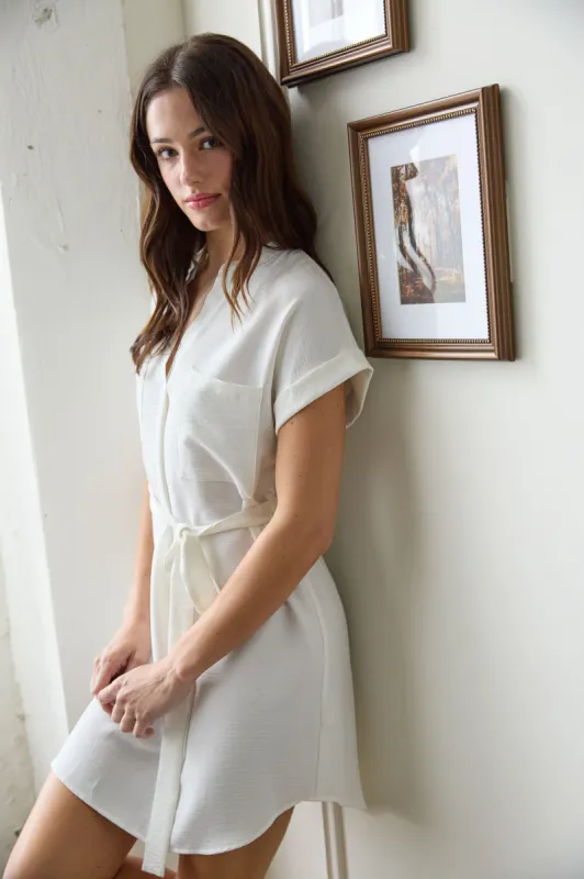 BACK BUTTONED BELTED MINI DRESS sold by Blu Pepper