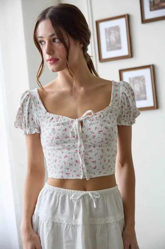 FLORAL TIE FRONT SHORT SLEEVE KNIT CROP TOP sold by Blu Pepper