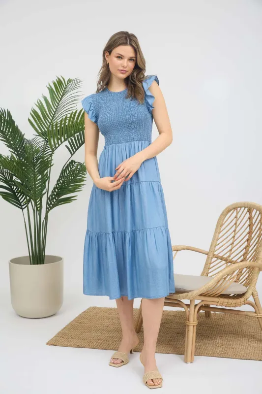 CHAMBRAY SMOCKED RUFFLE SLEEVE TIERED MIDI DRESS sold by Blu Pepper