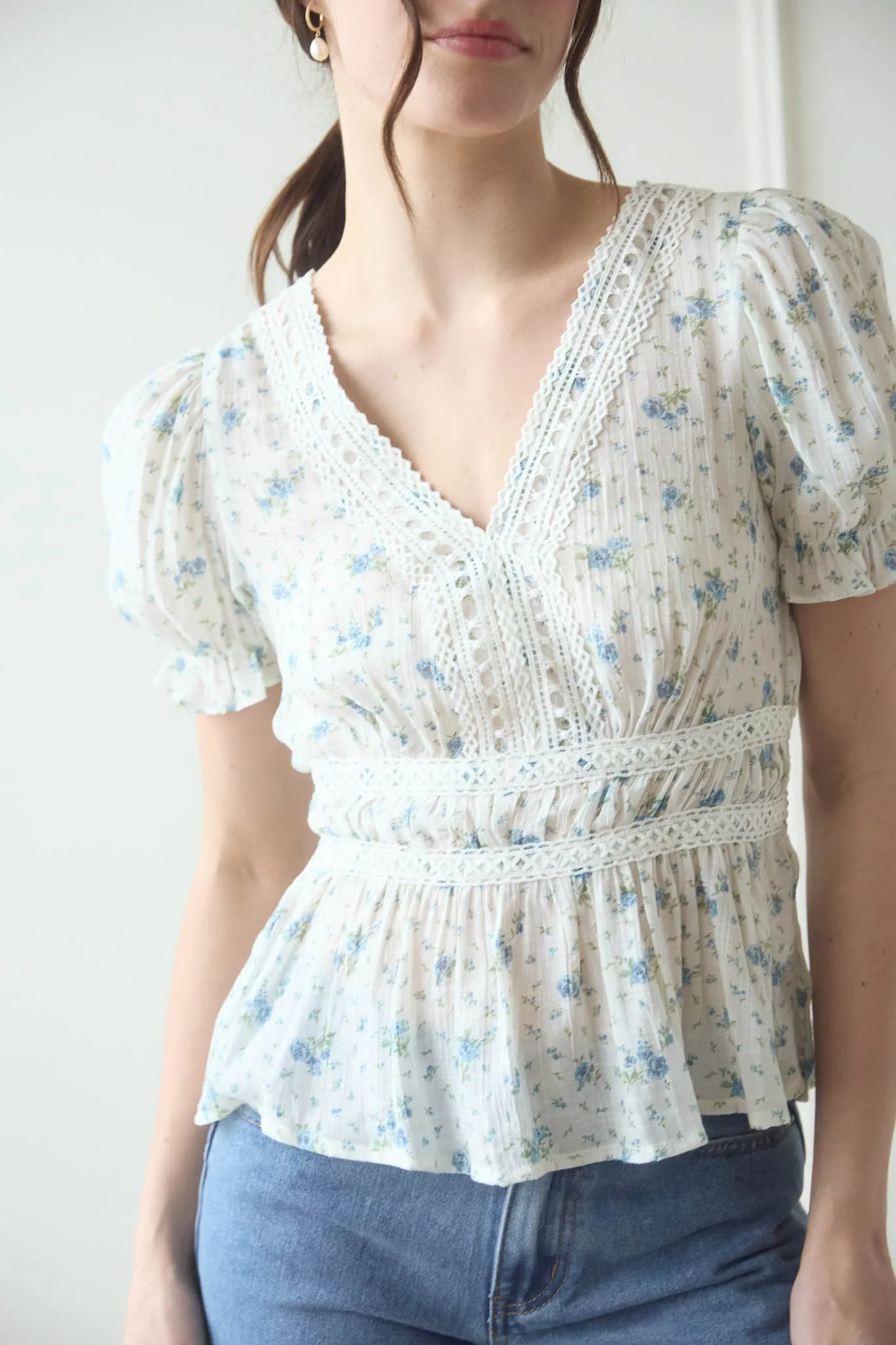 V NECK CROCHET LACE TRIM FLORAL TOP sold by Blu Pepper